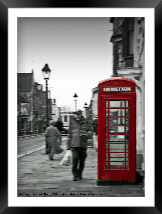 Red telephone box on a Black and white background Framed Mounted Print by Carl Shellis