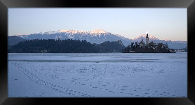 Frozen Lake Bled Framed Print by Ian Middleton