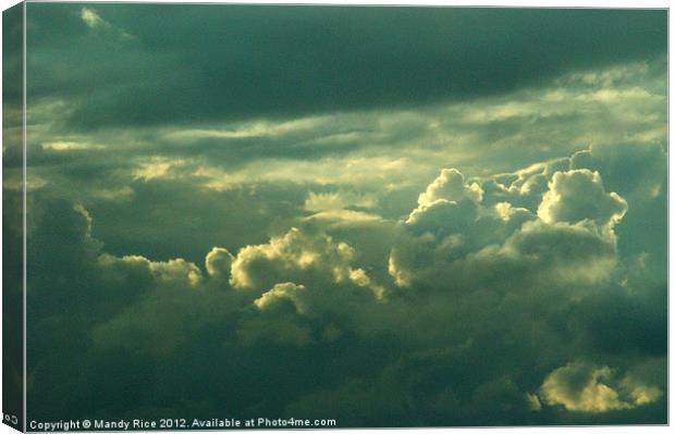 Sunset shining behind clouds Canvas Print by Mandy Rice