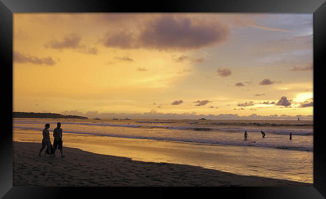 Sunset walk, Playa Tamarindo Framed Print by Eyal Nahmias