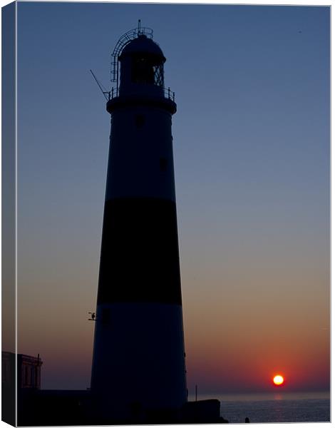 Portland Bill Lighthouse at dawn Canvas Print by Keith Barker