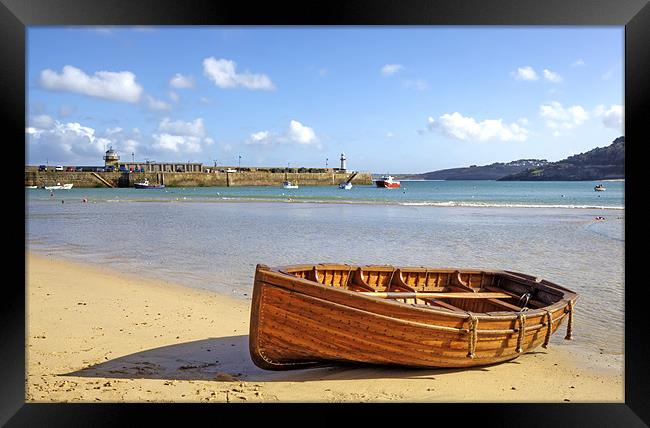 Beached on St Ives Cornwall Framed Print by Mike Gorton