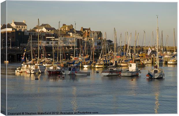 Bridlington Harbour in evening light Canvas Print by Stephen Wakefield