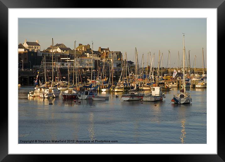 Bridlington Harbour in evening light Framed Mounted Print by Stephen Wakefield