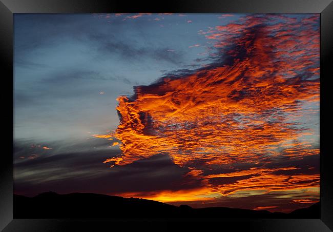 fire in the sky Framed Print by Martina Stoecker
