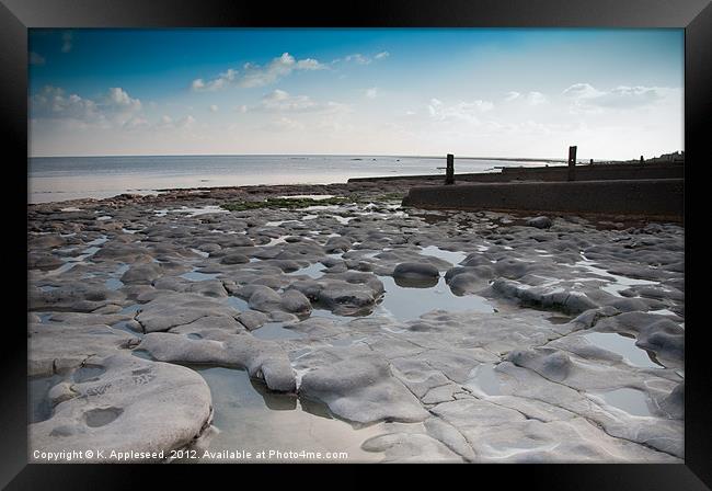 Lyme Regis Fossil Rock Beach. Framed Print by K. Appleseed.