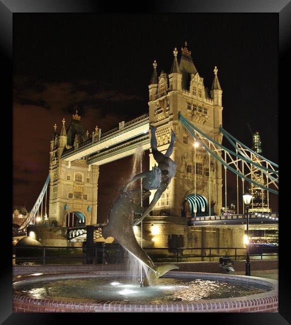 Tower Bridge and Girl with a Dolphin Fountain. Framed Print by Becky Dix