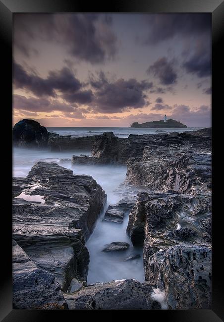 The Lighthouse Waters Framed Print by Kieran Brimson