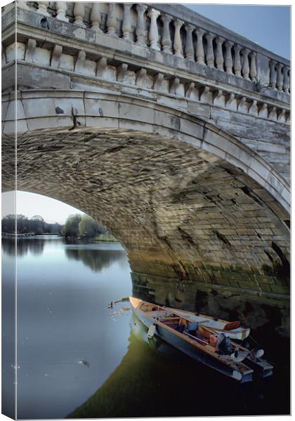 Underneath the arches Canvas Print by Chris Manfield