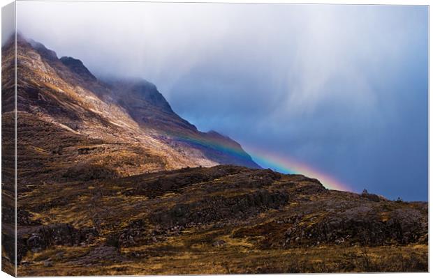 Snowbow in the Scottish Mountains Canvas Print by Jacqi Elmslie