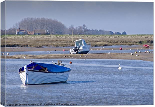 Boats in the Creek at Burnham Overy Staithe Canvas Print by john hartley