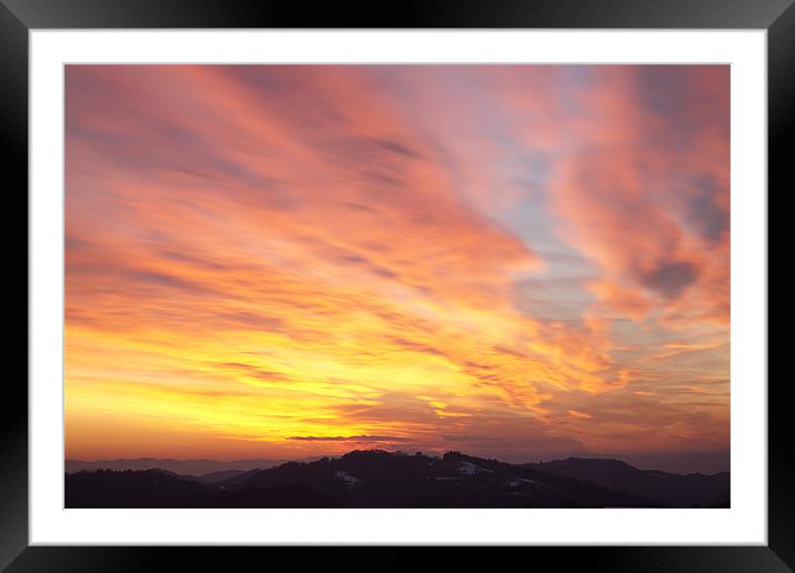 flaming sunset Framed Mounted Print by Ian Middleton