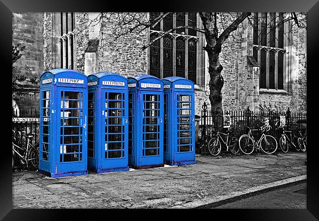 Blue Phone Boxes Framed Print by Paul Macro