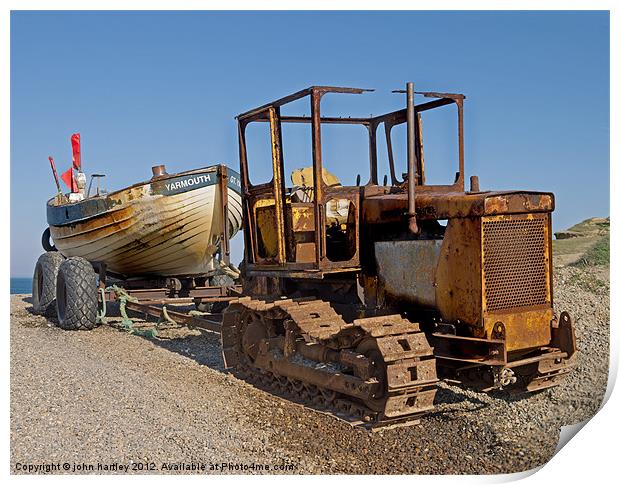 Rusty Caterpillar Beach Tractor with Fishing Boat  Print by john hartley