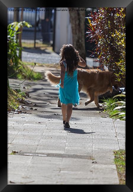 young girl walking her dog Framed Print by Craig Lapsley