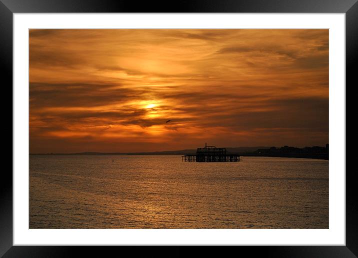 sunset brighton old pier Framed Mounted Print by Jolanta  Raczynska