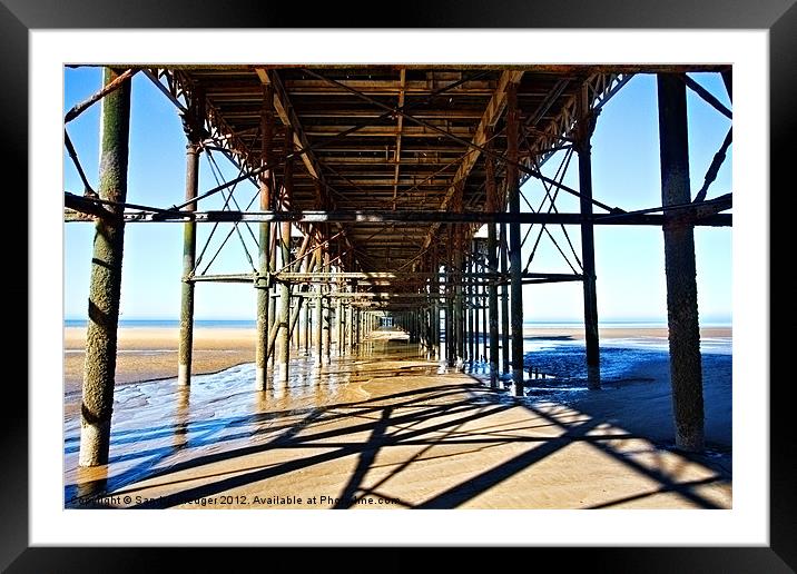Underneath the Pier Framed Mounted Print by Sandra Pledger