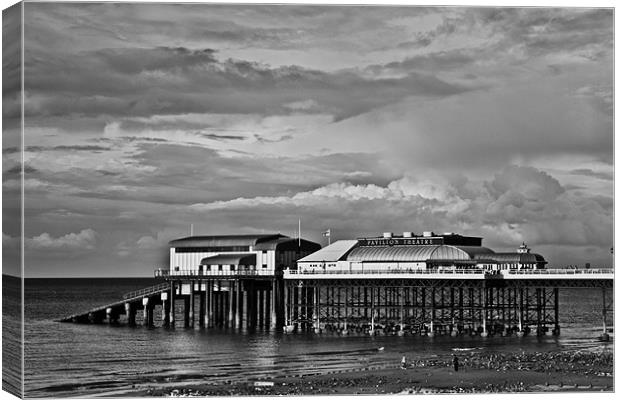 Storms over Cromer Pier Canvas Print by Paul Macro