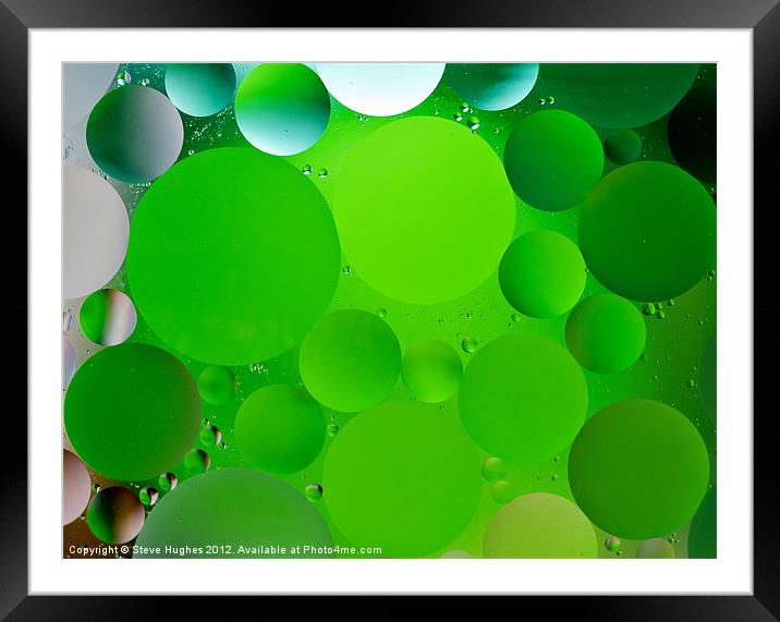 Green oil and water circles Framed Mounted Print by Steve Hughes