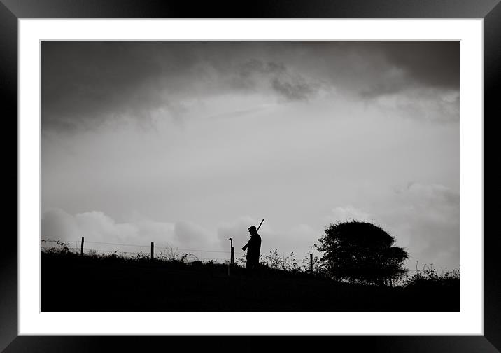 Man Walking With Shotgun Framed Mounted Print by Chris Martin