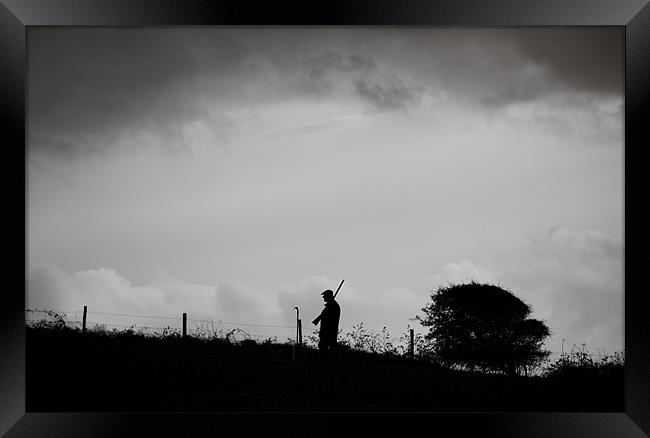 Man Walking With Shotgun Framed Print by Chris Martin