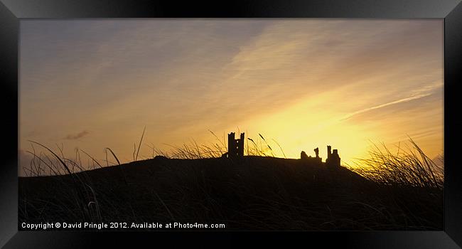 Dunstanburgh Castle Sunrise Framed Print by David Pringle