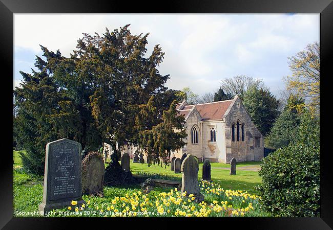 Churchyard in Spring Framed Print by John Biggadike