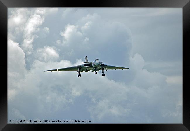 Vulcan landing before the storm Framed Print by Rick Lindley