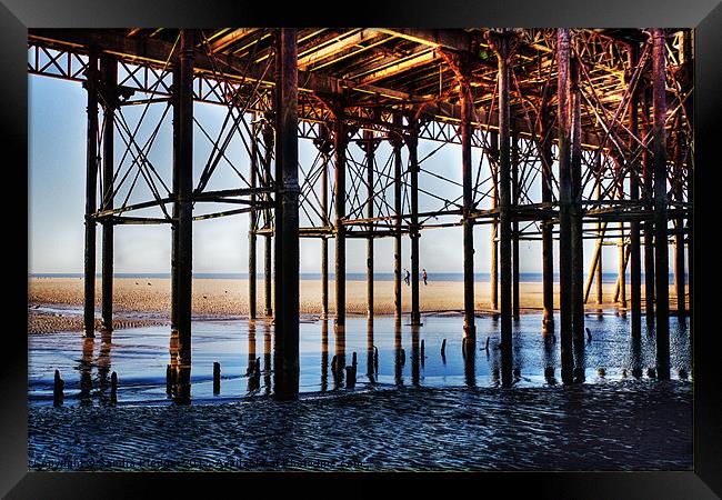 View from under the pier Framed Print by Sandra Pledger