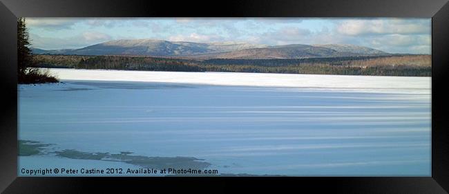 Mountains Over Frozen Lake Framed Print by Peter Castine