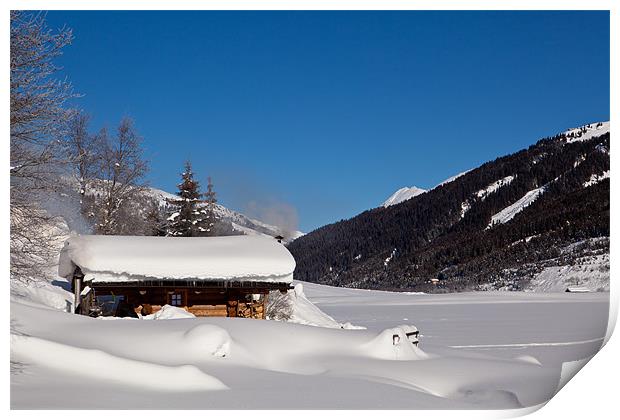 Lonely hut a a snowy lake Print by Thomas Schaeffer
