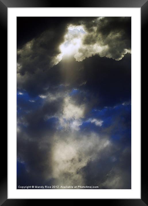 Rays through storm clouds Framed Mounted Print by Mandy Rice