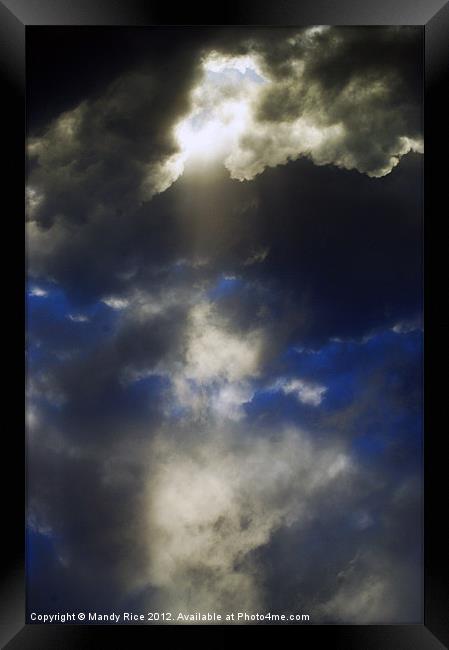 Rays through storm clouds Framed Print by Mandy Rice