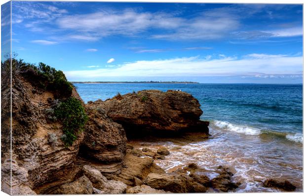 Rocks off Point Lonsdale Canvas Print by Roger Green