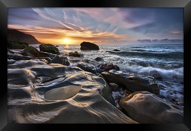Waves of stone Framed Print by mark leader