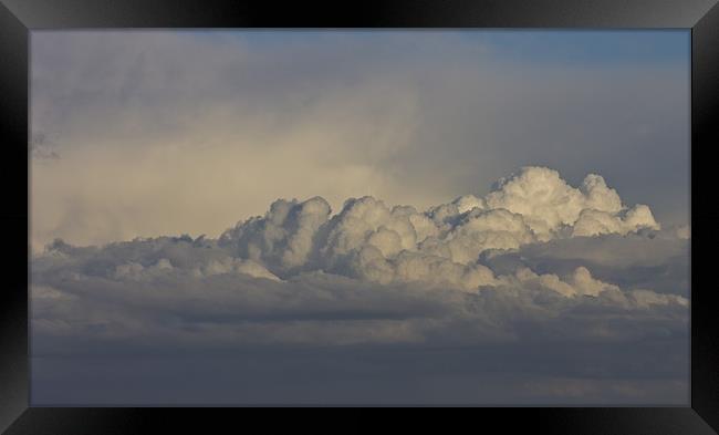 raging clouds Framed Print by simon plumridge