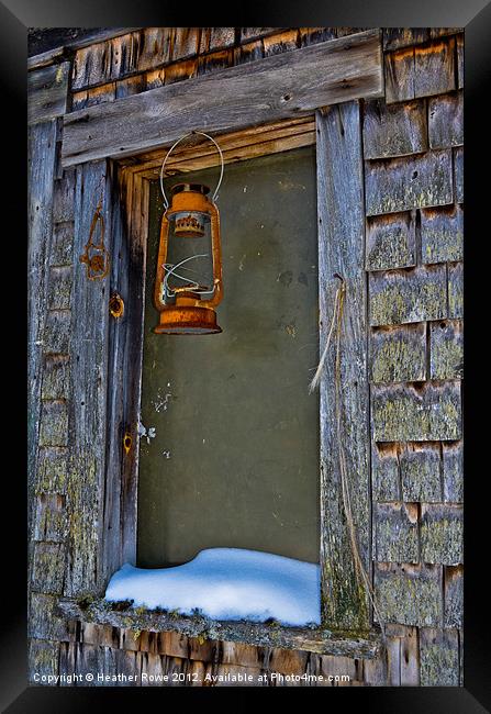 Rusty Lamp and a Snowy Ledge Framed Print by Heather Rowe