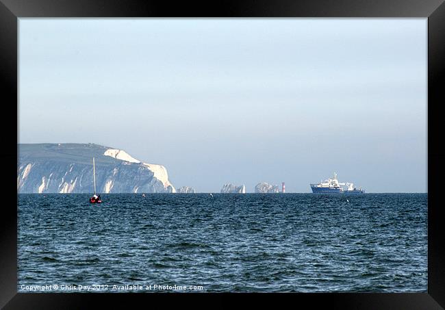 Needles on the Isle of Wight viewed from Mudeford Framed Print by Chris Day