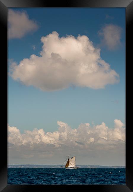 Sailing boat and cloud Framed Print by Gary Eason