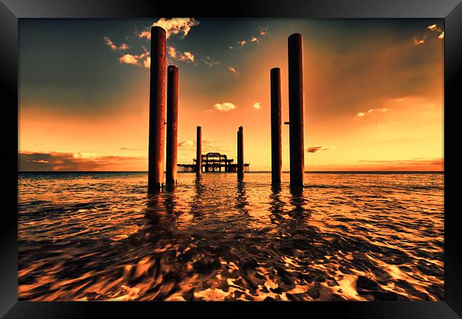 sunset across brighton pier Framed Print by Dean Messenger