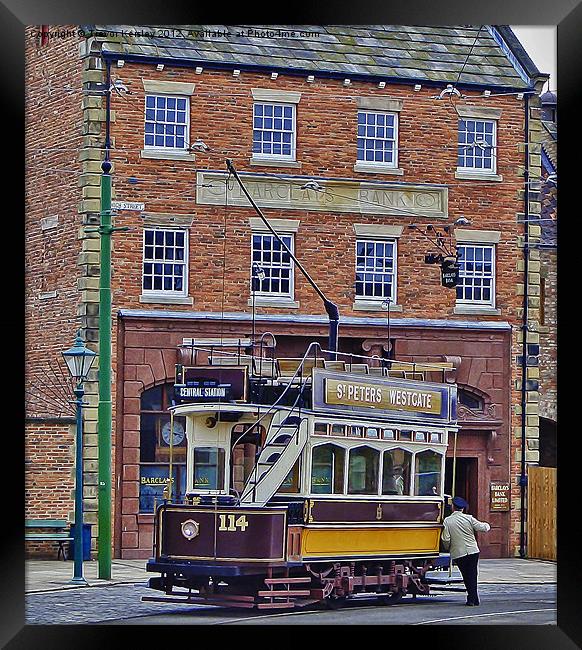 At The Tram Stop Framed Print by Trevor Kersley RIP