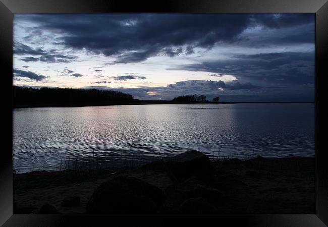 sunset over water Framed Print by martin scrivens-tudge