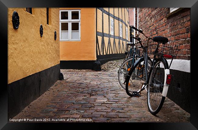 Bicycles in Ribe Framed Print by Paul Davis