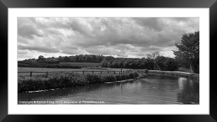 Canal on a cloudy day Black and White Framed Mounted Print by Daniel Fong