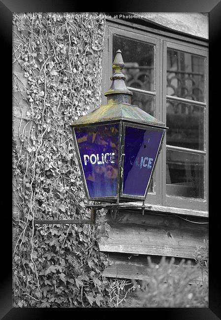 Police blue light. Framed Print by John Morgan
