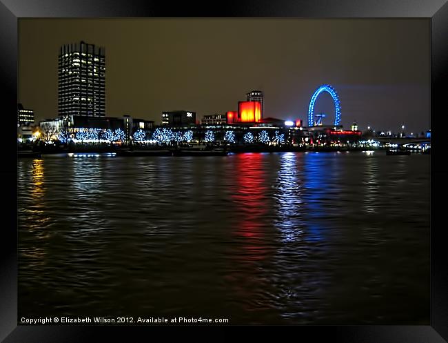 Lights on the River Thames Framed Print by Elizabeth Wilson-Stephen