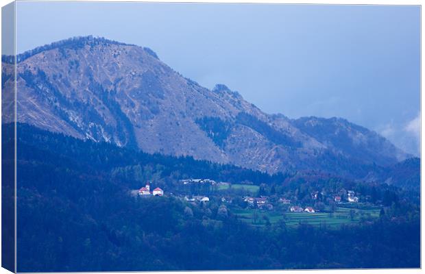 Mountain village Canvas Print by Ian Middleton