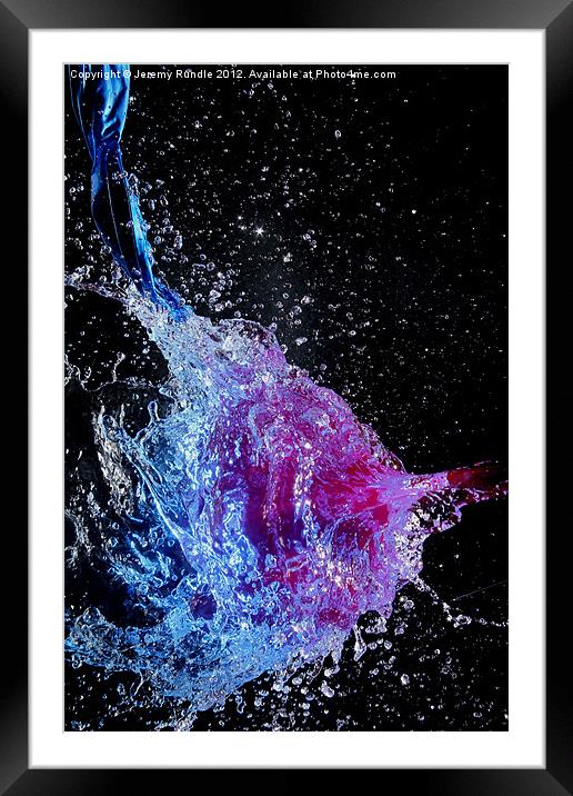 Water filled balloon burst Framed Mounted Print by Jeremy Rundle