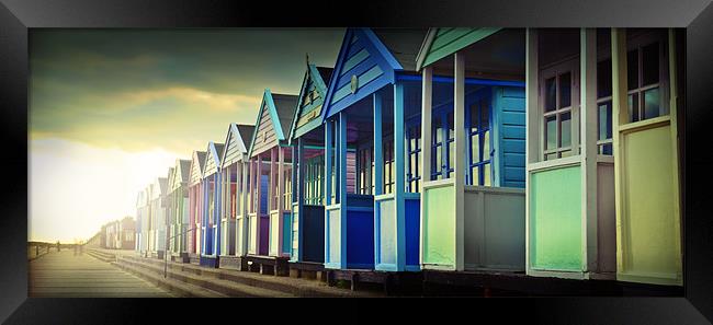 Beach Huts at Sunset Framed Print by James Rowland