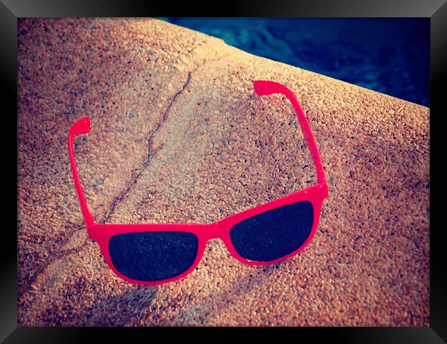 Sunglasses by the pool Framed Print by Amber-Rose Adkins